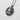 Baby girl pendant, oxidized silver, angled perspective showing sculpted relief