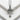 Close-up of the minimalist Celtic cross pendant resting flat on a textured white stone surface highlighting the finish.