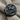 Saint George Dragon Slayer Ring, black rhodium, angled view on fabric