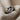 Close-up detail of the oxidized silver infinity knot ring emphasizing the seamless figure-eight loop craftsmanship.