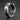 Close-up angled view of the oxidized silver industrial hoop earring highlighting the geometric flat band