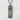 Do Kanji Bar Pendant, oxidized silver, front view on textured wall