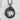 Coiled Dragon Pendant, oxidized silver, front view on stone