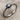 Celestial Sun Ring, oxidized silver, angled product photo on linen