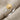 Scallop Seashell Ring, two-tone, product view on fabric