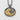 Detailed view of the handcrafted Great Wave pendant highlighting the sculpted gold cresting ocean wave and silver sky.