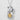Close-up of the lucky cat Maneki Neko pendant highlighting the intricate oxidized silver details and gold coin