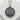 Tokyo Tower Medallion Pendant, front view on white stone background