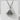 Smiling Onigiri Pendant, oxidized silver finish, front view on stone