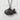 Taiyaki Fish Pendant, black rhodium, front view on textured background