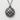 Close-up of the domed melon pan pendant highlighting the dark oxidized grooves and polished silver finish