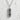 Close-up of handcrafted yakitori skewer pendant on textured background, highlighting the deep oxidized grill mark details.