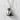 Frontal close-up of the Japanese izakaya inspired sterling silver sake set necklace against a textured wall