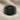 Hittite Seal Ring, black rhodium, front view on fabric