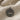 Close-up of the oxidized silver stag earring showing intricate antler details and polished ray tips on the outer rim.