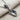 Close-up angled view of the handcrafted OK hand pendant lying flat on textured fabric highlighting the 3D silver artistry