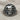 Jester Skull Ring, oxidized silver, front product view on fabric
