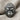 Mountain Gorilla Ring, oxidized silver, front view resting on linen cloth