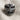 Lobotomy Skull Ring, oxidized silver, front view on textured fabric