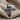 Wood Grain Crucifix Ring, oxidized silver, front angle product photo on fabric