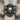 Pirate Crossbones Skull Ring, oxidized, front view on textile fabric