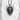 Close-up of the handcrafted Oni mask pendant highlighting the textured oxidized silver finish on a stone surface