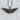 Close-up of handcrafted pilot wings pendant showing intricate feather texturing on a rustic grey background.