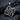 Polished silver eternity knot pendant necklace featuring sparkling white stones and central star