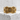925 silver Art Deco geometric band ring featuring ornate scrollwork displayed on a grey concrete block