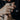 Twisted Rope Last Supper Ring worn on model's hand alongside other rings