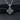 Angled shot of silver maltese cross pendant highlighting sturdy bail and intricate metalwork details