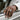 Templar Cross and Crown Ring worn on model hand resting on car door