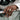 Magna Est Veritas Ring worn on model hand on car door
