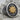Taino Sun Ring, two-tone silver and gold finish on stone display