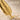 Close-up detail of hand-finished feather quill lines and base structure on handcrafted silver pendant