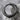 Fissured Brutalist Hoop Earring, black rhodium, angled product view on stone
