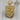 Dragon Shield Pendant, gold vermeil, front view resting on wood block