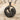 Aquarius Water Carrier Pendant, black rhodium, front view on shell
