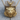 Roaring Panther Pendant, gold vermeil, product photo on wood