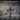 Detail graphic highlighting 925 sterling silver craftsmanship and oxidized finish on crucifix earring