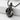Dragon Claw D20 Pendant, black rhodium, product photo on stone pedestal