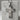 Detailed view of oxidized silver Proverbs cross pendant engraved with scripture on marble block