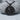 Saint George Dragon Slayer Pendant, black rhodium, product photo on stone