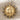 Celestial Sun Face Pendant, two-tone, front view on fabric