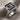 Floral Initial Signet Ring, oxidized silver, angled product view on fabric