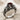 Gothic Skull Solitaire Ring, oxidized silver, three-quarter view on fabric