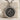 Garden Skeleton Pendant, oxidized silver, product photo resting on marble block