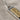 Luwian Life Hieroglyph Earring, two-tone finish, close-up of hieroglyph detail
