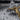 Fleur-de-Lis Crucifix Pendant, close-up of the corpus and INRI banner
