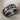 Taurus Zodiac Sign Ring, oxidized silver, angled side view on linen